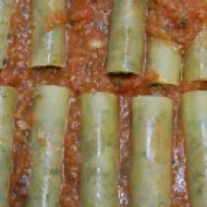 Cannelloni with minced meat cheese olives basil and tomatos