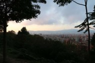 Overlooking city of Barcelona from the mountains during sunset time