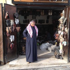 Al Salt, AsSalt, Al-Salt, AlSalt, Jordan، مدينة السلط الاردن, ancient city and architecture, a Jordanian man welcoming us into the small shoe shop