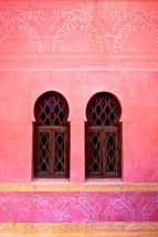 Red wall with Islamic Architecture and Windows