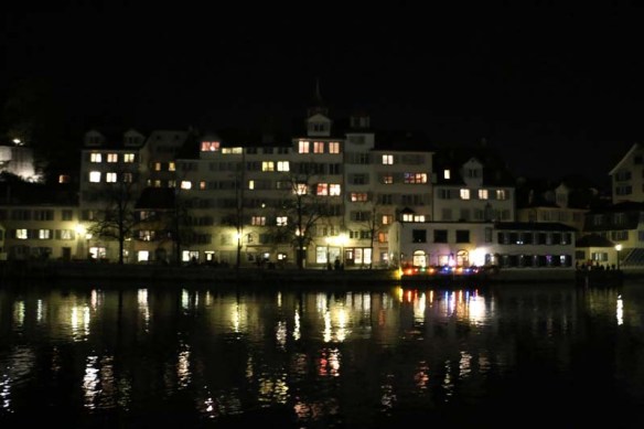 A photograph of Zurich colorful lights reflecting on Lake Zurich 