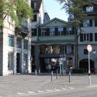 A photograph of green old building in Zurich Altstadt old town first district